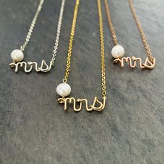 Mrs lowercase classy script necklace. Made from 14k gold wire and chain and 8mm off white freshwater Pearl. Select 14k gold filled or 14k solid gold. Select 14k solid gold if you want a tarnish free lifetime necklace that can be worn occasionally in the shower. 14k solid gold is also great for sensitive skin and will last a lifetime. 14k gold filled can remain tarnish free and can last a lifetime if cared for properly. Jewelry care instructions are included with your purchase. It is not recommen Delicate Personalized Necklaces For Wedding Gift, Minimalist Initials Jewelry For Wedding, Dainty Initials Charm Necklace For Wedding, Minimalist Wedding Charm Necklaces With Initials, Dainty Name Necklace With Initials For Wedding, Gold Sterling Silver Pearl Necklace For Wedding, Minimalist Initials Charm Necklace For Wedding, Elegant 14k Gold White Name Necklace, Elegant White 14k Gold Name Necklace