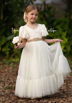 Make your little one feel like a princess on your special day with our Elegant Ivory Tulle & Lace Flower Girl Dress! Designed with a delicate lace bodice and a dreamy tulle skirt, this dress is perfect for any Romantic, Disney, Modern, or Elegant Wedding Theme. Complete the enchanting look with matching accessories for a truly magical ensemble. Ideal for weddings, birthdays, and portraits, this dress is a must-have for any fairy tale occasion. Shop now at our Flower Girl Dress Boutique Online! H Ivory Flower Girl Dress, Rustic Flower Girl Dress, Chat Bubble, Girl Parties, Elegant Wedding Themes, Rustic Flower Girls, Full Tulle Skirt, Girls Dress Shop, Ivory Flower Girl