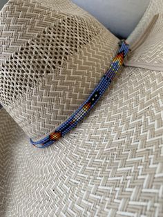 "1/4\" wide All bead work is beaded with 10lb extreme braided nylon line. All hat bands are finished at 23\" with glued than sewed down leather ends and an adjustable leather tie." Adjustable Woven Hat With Flat Crown, Bohemian Handwoven Adjustable Hat Bands, Adjustable Multicolor Ranch Hats, Adjustable Handwoven Hat Bands For Rodeo, Western Style Adjustable Handwoven Hat Band, Adjustable Braided Hat Bands For Rodeo, Traditional Adjustable Hat Bands For Rodeo, Braided Hat Bands For Festivals With Flat Brim, Adjustable Beach Hat Bands