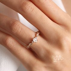 Diamond, which is the hardest material in the world formed centuries ago, has turned into a symbol showing the infinity and value of love over the years. We carefully design these jewels that you will wear as a symbol of the eternity of your love. 🔻 Diamond ring will look amazing on your lover's finger! 🔻Engagement rings will bring luck to your new family! 🔻Promise Ring will connect lovers forever! 🔶 Total Carat: 0.40CT 🔶 Stone Pieces: 13 🔶 Main Stones Measurement: 0.25CT - 5X3MM 🔶 Edge Stones: ROUND: 0.15CT -1.40MM 🔶 Gold Carat: 14 K  🔶Silver 925 💌 Zircon Stone 📌Zircon is a stone that strengthens the mind and memory. 📌It opens the closed chakras of people and revitalizes the aura. 📌It provides easy sleep. It helps to keep people away from bad dreams and nightmares. 📌It has a Classic Simple Promise Jewelry, Classic Simple Design Jewelry For Promise, Classic Simple Design Promise Jewelry, Fine Jewelry Crystal Promise Ring, Elegant Stackable Rings With Emerald Cut, Promise Rings With Rose Cut Diamonds, Dainty Cluster Ring With Rose Cut Diamonds For Promise, Elegant Stackable Emerald Cut Rings, Dainty Jewelry With Diamond Accents Open Ring