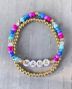 "Mama Bracelet 🤍 Simple, chic Mama bracelet Made with 4mm colored seed beads, 18k gold filled accents and 6mm gold circle letters that read \"Mama\" Gold bracelet made with 18k gold filled beads If you would like another word or color, please put in Personalization Section* and we will contact you if we have questions.  CARING TIPS FOR YOUR JEWELRY ⭐️Treat and store with care. ⭐️ For longevity, avoid exposing your jewelry to water. ⭐️ Avoid having direct contact with lotions, perfumes, sanitizers as these chemicals may cause discoloration of your jewelry." Multicolor Beaded Jewelry For Mother's Day, Multicolor Round Beads Jewelry For Mother's Day, Multicolor Charm Bracelet With Round Beads For Birthday, Multicolor Bracelet Jewelry For Mother's Day, Personalized Bohemian Beaded Bracelets For Mother's Day, Multicolor 8mm Beads Jewelry For Mother's Day, Multicolor Beaded Bracelets For Mother's Day Gift, Handmade Multicolor Bracelets For Mother's Day, Multicolor Friendship Bracelets For Birthday And Mother's Day