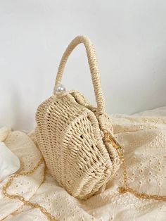 Chic and stylish, the Elena Handbags Summer Straw Shell Shape Shoulder Purse is a luxurious addition to your accessories. Crafted from straw and beautifully shaped like a seashell, this purse is an exquisite blend of form and function. Its elegant design makes it the ideal accessory for a day in the city or an evening on the beach. Size: 23cm wide x 15cm tall (9in x 6in) Designer Style ID: 8473 Seashell Purse, Grandma Vibes, Purse Aesthetic, Coastal Grandma, Small Messenger Bag, Small Crossbody Bag, Small Purse, Designer Style, Shoulder Purse