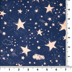 a ruler with stars and clouds on it