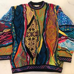 Coogi Men’s Xl Sweater Mercerized Cotton - Medium Weight Gently Used And Well Cared For, With No Smell, Stains, Snags Or Tears. Flat Measurements: Pit To Pit Is 26” Pit To Waist Is 16” Sleeve To Sleeve Is 66” Shoulder To Sleeve Is 24” Smoke And Pet Free Environment. Crochet Pullover Pattern, Coogi Sweater, Oversized Polo, Heavy Coat, Vintage Sweater, Collar Sweater, Sweaters Crewneck, Vintage Sweaters, Embroidered Design