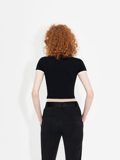 MO&Co. Women's Slanted Placket Knit Top Features : - Curved hem, stand collar neck- Ribbed knit top- Fitted and cropped silhouette, contrast trim details Code: MBC2SWT014The back length of size S is 48cmMATERIALS & CARE Material: 68.4% Viscose 31.6% PolyamideOur sizes might be a little different from US/EU sizes. Please check the size chart and choose your size based on your body measurement and preferred style.REMINDER: All items are measured manually. Please note that it's reasonable that ther Fitted Tops With Contrast Color For Layering, Fitted Black Top With Contrast Trim, Fitted Top With Contrast Collar For Spring, Stretch Crop Top With Contrast Color, Black Tops With Contrast Trim For Workwear, Black Tops With Contrast Collar For Spring, Black Tops With Contrast Trim For Work, Fitted Black Top With Contrast Collar, Fitted Tops With Contrast Collar For Workwear