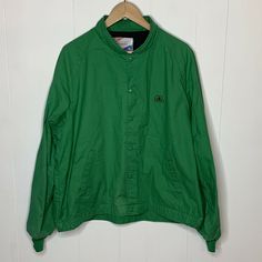 Vintage Pioneer Seed Jacket 80s Swingster Farm Workwear  Men's XL Free of rips, holes, stains or tears.  light discoloration around the bottom snap - see photo.  Consistent with age and wear. 25.5" pit to pit Length:  26 3/4" Vintage Green Cotton Windbreaker, Vintage Cotton Windbreaker For Streetwear, 80s Mens, Mens Workwear, Nike Jacket, See Photo, Long Sleeve Tshirt Men, Work Wear, Athletic Jacket