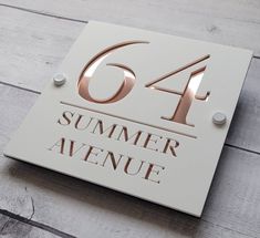 A contemporary house sign that will put the finishing touch to the front of your home. This door number sign is made from a 3mm white or black acrylic with an contrasting 3mm coloured acrylic backing. There are several choices of backing colours which are mirrored silver, gold, rose gold, mirrored red, mirrored blue or orange. All materials are UV stable and weather resistant making this modern house sign one of the toughest on the market. The photos don't do them justice - they are stunning! 30 x 30cm size sign comes with 4 fixings in the corners. Home signs are supplied with all fixtures and fittings with everything you need to install yourself. Dispatched within 1-3 working days. House Number Ideas Outdoor, Front Door Numbers, Door Number Sign, Door Number Plaques, Signage Board, Name Plates For Home, House Plaques, Address Signs, Door Number