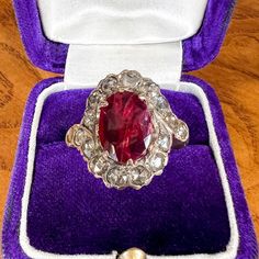 Antique Ruby & Rose Cut Diamond Ring sold by Doyle and Doyle an antique and vintage jewelry boutique Oval Rose Cut Diamond Ring With Ruby Accents, Oval Ruby Cluster Ring With Rose Cut Diamonds, Oval Ruby Ring With Rose Cut Diamonds, Heirloom Oval Cluster Ring With Rose Cut Diamonds, Victorian Oval Gemstone Diamond Ring, Victorian Oval Diamond Ring With Gemstone, Victorian Oval Diamond Ring With Rose Cut Diamonds, Oval Ruby Ring With Rose Cut Diamonds For Anniversary, Victorian Oval Diamond Ring With Halo Setting