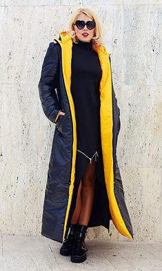 Long coat, a puffer jacket with hood, warm, playful and comfortable. Padded yellow and black coat with zipper closure and adjustments. Black and orange winter coat, outstanding and daring that will steal the spotlight! Double face winter jacket. Material: slicker 100% poliester Care instructions: Dry clean only The model in the picture is size S. Can be made in ALL SIZES. If you have any other specific requirements, do not hesitate to contact me! I DO NOT CHARGE EXTRA MONEY for custom made items Winter Nylon Parka With Long Sleeves, Hooded Puffer Outerwear For Winter, Winter Hooded Puffer Parka, Trendy Hooded Nylon Outerwear, Trendy Puffer Hooded Jacket, Winter Nylon Hooded Jacket For Cold Weather, Trendy Hooded Parka For Cold Weather, Winter Nylon Parka With Fleece Lining, Long Winter Windbreaker For Streetwear