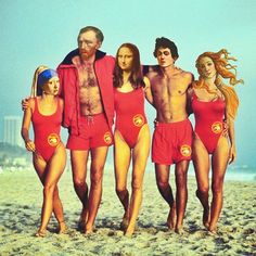 a group of people standing on top of a beach next to each other wearing red swimsuits