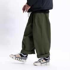 Trendy Baggy Solid Color Pants, Trendy Baggy Pants In Solid Color, Wide Leg Streetwear Pants, Non-stretch Wide Leg Cargo Pants In Solid Color, Non-stretch Solid Color Wide Leg Cargo Pants, Trendy Baggy Harem Pants, High Waist Relaxed Fit Solid Color Harem Pants, Stretch Casual Harem Pants, Wide Leg Green Winter Pants