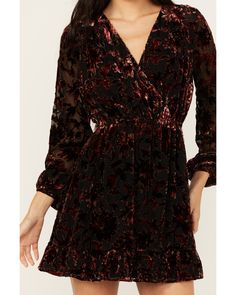 Model is 5'8 1/2" wearing a size extra small. 60% rayon / 40% nylon. Surplice neckline. Long sleeves with elastic cuffs. Mini length. Boho Cowgirl Style, Burnout Velvet Dress, Burnout Velvet, Peasant Dress, Western Dresses, Romper With Skirt, Western Outfits, Velvet Dress, Western Wear