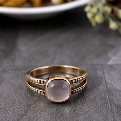 Rose Quartz Ring, Rose Quartz Gemstone Ring, Back to School Gift for Her, statement Ring, Birthstone Ring, Boho Ring, Dainty ring, boho ring Enjoy Free Shipping on All Orders Product Description:- *Handmade item *Dispatches from a small business in India *Materials         :-   Brass, silver *Band colour    :-   Gold,  silver *Style                 :-   Boho & hippie *Can be personalized Ring Type                :-     Gemstone  Ring SIZE           :-    All Size Are Available. Choose From Variation. METAL           :-    Pure  Brass or 925 sterling silver ( Nickel  Free Ring )                              :-    All Metal Are Available. Choose From Variation.  Gemstone               :-     Rose Quartz Stone Shape           :-     Cushion Ring can be customized on request and gemstone can b Bohemian Pink Wedding Rings, Bohemian Pink Rings For Anniversary, Bohemian Pink Ring For Anniversary, Bohemian Rose Gold Ring Jewelry, Bohemian Rose Gold Rings For Gift, Bohemian Rose Gold Rings As Gift, Bohemian Rose Gold Rose Quartz Jewelry, Pink Bohemian Rings For Jewelry Making, Handmade Rose Gold Bohemian Ring