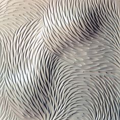 an abstract metal wallpaper with wavy lines and curves on it's surface, as well as in the background