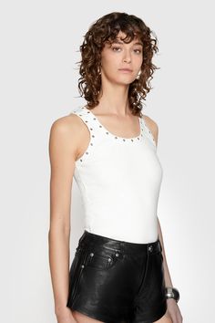 The Holly Tank boasts a round neckline and sleeveless design, elevated with stylish stud embellishments. Versatile and chic, it's perfect for layering or wearing solo. | Rebecca Minkoff Holly Studded Tank Top In White - Size L Studded Tank Top, Embellished Top, Fall 24, 2024 Trends, Jersey Top, Rebecca Minkoff, Bright White, Round Neckline, Things I Want