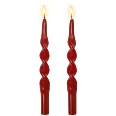 two red candles sitting next to each other