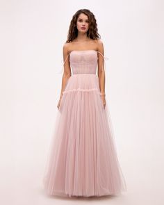 Tulle Evening Dress For Prom Season, Tulle Evening Dress For Prom, Floor-length Tulle Evening Dress For Prom, Prom Season Tulle Ball Gown, Fitted Tulle Bridesmaid Dress For Evening, Lined Bodice Evening Dress For Prom Season, Strapless Tulle Ball Gown With Corset Back, Strapless Tulle Ball Gown With Fitted Bodice, Prom Dress With Pleated Bodice In Tulle