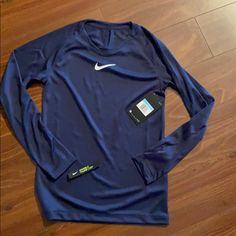 Youth Unisex Size Medium, Navy With White Detail, Thumb Loopholes, Perfect Condition, Never Worn, New With Tags, Non-Smoking Home Garage Clothes, Nike Shirts Women, Soccer Clothes, Long Sleeve Shirt Outfits, Nike Long Sleeve Shirt, Nike Clothes, Volleyball Shirts, Soccer Outfits, Sport Shirts