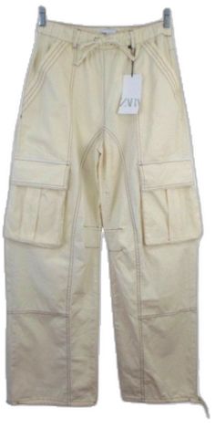 Cream Cotton Cargo Pants, Summer Wide Leg Bottoms With Contrast Stitching, Zara Cotton Cargo Pants With Side Pockets, Cream Utility Cargo Style Bottoms, Fitted Parachute Pants With Multiple Pockets For Spring, Cream Utility Bottoms With Cargo Style, Cream Utility Cargo Bottoms, High Waist Pants With Contrast Stitching For Spring, White Cargo Jeans With Multiple Pockets For Summer