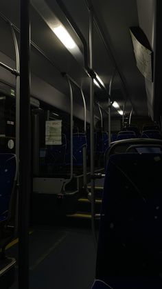 the interior of a public transit bus at night