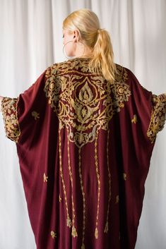 Please zoom on pictures for full resolution :) Hello, This is a stunning kaftan coat with gold applique embroideries circa 1970's. -Label: none -Size : please refer to measurements, kind of free of size -Fabric : feels like rayon -Condition: Very good, faint mark front bottom, please refer to close-up picture. Measurements: -Width: 91 cm / 35,8 inches -Length: 121 cm / 47,6 inches Feel free to contact me if you have any question, I'll be happy to answer you! This item is send with proof of sendi Bohemian Embroidered Kaftan For Fall, Bohemian Long Sleeve Abaya For Fall, Bohemian Long Thobe For Eid, Bohemian Long Kimono With Intricate Embroidery, Long Embroidered Abaya For Festival, Embroidered Long Abaya For Festival, Bohemian Long Thobe For Festivals, Red Oversized Bohemian Kaftan, Bohemian Kimono With Intricate Embroidery