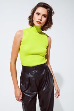 Brighten up your wardrobe with our Vibrant Lime Green Sleeveless Knit Top, a perfect blend of bold style and comfortable fit for your daily outfits. Eye-Catching Lime Green: This top's vivid lime green hue is sure to make a statement, adding a fresh and lively touch to your wardrobe. Sleek Turtleneck Design: The high turtleneck neckline adds a touch of elegance and sophistication, making it a versatile piece for various occasions. Comfortable Bodycon Fit: Crafted from a soft blend of 55% Viscose Neon Top Outfit, Lime Green Shirt Outfit, Lime Green Top Outfit, Top Without Sleeves, Lime Green Outfits, Green Shirt Outfits, Green Top Outfit, Warm Spring Outfits, Neon Green Top