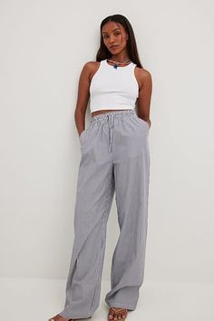 Elastic Waist Linen Trousers White | NA-KD Trendy Cotton Bottoms With Tie Waist, Chic Drawstring Cotton Pants, Relaxed Fit Cotton Pants With Tie Waist, High-waisted Cotton Wide Leg Pants With Tie Waist, Cotton High-waisted Wide Leg Pants With Tie Waist, Cotton Wide-leg Pants With Tie Waist, Cotton Wide Leg Ankle-length Pants With Tie Waist, Summer Wide Leg Pants With Drawstring For Work, Summer Wide Leg Drawstring Pants For Work