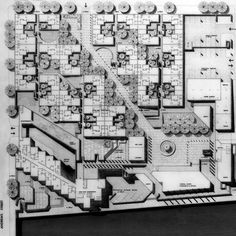 an architectural drawing shows the layout of a building with several floors and courtyards, as well as many other buildings