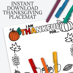 a thanksgiving coloring page with markers and pencils