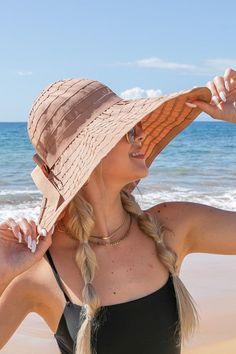 Stay shaded and stylish with the Classic Bow Accent Sunhat! The extra wide brim adds maximum protection while the cute bow accent adds a touch of playfulness. Perfect for lazy beach days or outdoor events, this sunhat is a summer must-have! Extra wide brim for full coverageBow accent detailWired brim Foldable/packable100% PolyesterCircumference: 22.25"Brim Length: 6.25" Corner Pattern, Woman With Hat, Holiday Leggings, Floppy Hats, Patriotic Tees, Scarf Poncho, Winter Tops, Outdoor Events, Wide Brimmed Hats