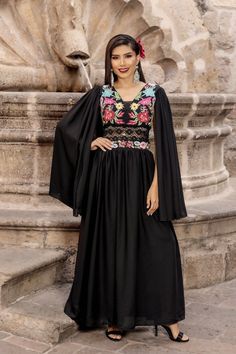 Step into elegance with our enchanting Mexican embroidered dress crafted from delicate chiffon, exquisitely adorned with intricate traditional embroidery.  Elevate your style with removable long flow sleeves, offering versatility and sophistication for any occasion. There is elastic on the back for a comfortable yet adjustable fit.  This gorgeous dress is a Solei exclusive design. More styles available here: https://www.etsy.com/your/shops/SoleiEthnic/tools/listings/section:25367133 Formal Mexican Dress, Wedding Dress With Multicolor Embroidery On Georgette, Georgette Wedding Dress With Multicolor Embroidery, Intricate Embroidery Maxi Dress For Traditional Ceremonies, Embellished Multicolor Embroidery Dress For Eid, Elegant Resham Embroidered Dress, Elegant Festive Dress With Multicolor Embroidery, Festive Georgette Dress With Multicolor Embroidery, Festive Multicolor Embroidered Georgette Dress