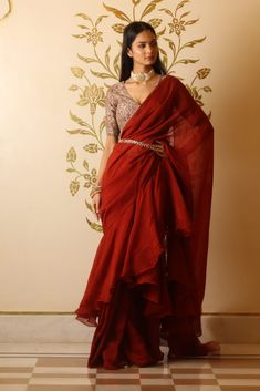 Rustic red organza ruffle saree with chanderi print embroidered blouse. It comes with moti embroidered belt to enhance the look. Organza Ruffle Saree, Indo Western Saree, Pant Saree, Black Embroidered Blouse, Mirror Work Saree, Maroon Pants, Mirror Work Blouse, Lehenga Suit, Ruffle Saree