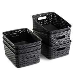 three black baskets sitting next to each other