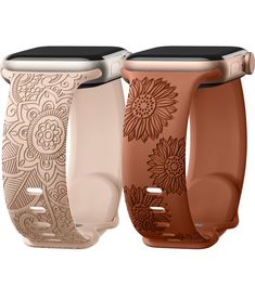 three apple watch bands in different colors and designs, each with an intricate flower design