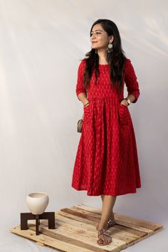 Red front gathered ikat dress with front pockets Fabric details - Pure Cotton Ikat Length 42 inches Sizes XS - shoulder 13.5, chest 32, waist 26, hip round 36 S - shoulder 14, chest 34, waist 28, hip round 38 M - shoulder 14, chest 36, waist 30, hip round 40 L - shoulder 14.5, chest 38, waist 32, hip round 43 XL - shoulder 14.5, chest 40, waist 35, hip round 45 XXL- shoulder 15, chest 42, waist 37, hip round 47 Model wearing size XS, chest 32 Country of Origin: India Please take note: Dark color Cotton Frocks For Women, Feeding Dresses, Frock Models, Cotton Dress Pattern, Ikkat Dresses, Long Gown Design, Simple Frocks, Casual Frocks, Cotton Frocks