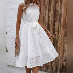 New Flowy Sheer Eyelet Lace Short Halter Dress * Sleeveless * Halter Neck * High Waist * Tie Belt * Flare A Line Skirt * Lined Short Skirt *Approximate Unstretched Measurements* Small (4) * Bust 37.5" * Waist 25.25"(Up To 27") *Length 43" Medium (6) * Bust 39" * Waist 26.75"(Up To 29") *Length 43.25" Large (8/10) * Bust 41.25" * Waist 29"(Up To 31.5") * Length 43.5" Xl (12) * Bust 44" * Waist 31.5"(Up To 34") * Length 44" In Transit ** Will Ship In 5 -10 Days Color : White Fabric : Flowy Poly #F Medium White Dress, White Sleeveless Halter Dress For Garden Party, Elegant Sleeveless Sundress For Garden Party, Feminine Sleeveless Knee-length Beach Dress, Feminine Knee-length Sleeveless Beach Dress, Feminine Sleeveless Halter Dress For Garden Party, Feminine Sleeveless Halter Dress For Day Out, Short Halter Dress, Halter Dress White