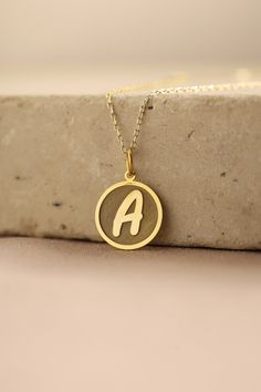 Gold Initial Pendant - Initial Gold Necklace ● Material of pendant: Solid Gold 14k ( REAL GOLD ) ● Metal Stamp: 14k ( REAL GOLD ) ● The pendant is available in 5 sizes: - 12,7 mm / 0.5 inches (Diameter) - 14,0 mm / 0,55 inches ( Diameter ) In the photos - 15,3 mm / 0.6 inches ( Diameter ) - 16,5 mm / 0,65 inches ( Diameter ) - 19,1 mm / 0,75 inches ( Diameter ) ( In the photos the size is 14mm / 0.55 inches Diameter ) ( Jump Ring inner diameter: 4 mm ) ● Material of chain: Solid gold 14k ( REAL GOLD ) It is thin and dainty and it is available in 4 sizes: - 40 cm / 15,75 inches ( Length ) - 45 cm / 17,72 inches ( Length ) In the photos - 50 cm / 19,68 inches ( Length ) - 55 cm / 21,65 inches ( Length ) ● Backside engraving is FREE ( Please use the personalization box for that.) ● If you wan Yellow Gold Initial Pendant Charm Necklace Stamped 14k, Personalized Yellow Gold Pendant Necklace, Yellow Gold Custom Pendant Necklace For Personalized Gift, Custom Yellow Gold Pendant Necklace For Personalized Gift, Gold Custom Initial Pendant Necklace Hallmarked, Gold Custom Initial Pendant Necklace, Yellow Gold Initial Pendant Necklace, Custom Gold Initial Pendant Necklace, Yellow Gold Initials Pendant Necklace