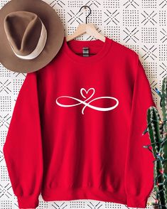 Infinity Love Sweatshirt, Forever Love Sweatshirt, Love Sweater, Valentines Day Crewneck Sweater, Birthday Gift, Gift for Love,Heart Sweater WELCOME TO "StyleDesignUS" High quality and super soft, comfortable Sweatshirt and Hoodies. Made with top of the line vinyl and pressed with a professional grade heat press. SIZING AND COLORS Make sure you check our size-chart before you place your order. If you are not sure about sizing please measure your favorite Sweatshirt or Hoodie and compare measurem Love Sweater, Love Sweatshirt, Gift For Love, Couples Sweatshirts, Infinity Love, Valentines Design, Heart Sweater, Custom Sweatshirts, Love Valentines