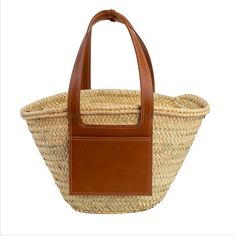 Handmade by craftswomen from our rural cooperative DOUM FOR WOMEN, our totes are made with impeccable craftsmanship and from high quality materials. Basket carryall bag as the perfect summer staple. Fresh, light and versatile tote with a rather rustic feel and a market vibe, ideal for strolling around in style from the beach to the city. This handwoven basket crafted from palm leaves is enriched with high-end classic vegan leather details, an exterior pocket and a removable canvas pouch with a z Paris Packing List, French Basket, Cute Mini Bags, Moroccan Basket, Spring Summer Capsule Wardrobe, Moroccan Women, Straw Basket, Hand Woven Baskets, Summer Bag