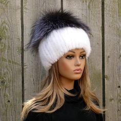 Luxuriously crafted, this mink fur hat is the epitome of elegance and warmth. Hand-knitted with chunky knit detailing, it exudes a stylish allure perfect for women who appreciate fine fashion. Adorned with a fluffy Silver Fox pompom, this hat adds a touch of playfulness to a classic design. Whether it's a gift for mom or a treat for yourself, this fuzzy mink hat promises cozy sophistication with a hint of whimsy. ✨ The pompom is not removable and is part of the hat. 🎀 **Highlights** 🦊 Made fro Elegant White Fur Felt Hat, White Faux Fur Winter Hat, Luxury Mink Winter Hat, Winter Faux Fur Mink Hat, White Beanie With Fur Pom Pom, Fur Keychain, Grey Fur, Chunky Knit Hat, Fur Accessories