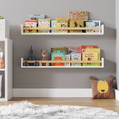 a child's room with bookshelves and toys