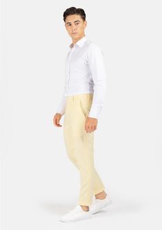 Crafted with a vibrant, cream yellow stretch cotton, these custom made pants are uniquely stylish and supremely comfortable, and will become a go to favorite when you're looking to stand out. Slim Fit Cotton Pants For Summer, Slim Fit Cotton Chinos For Summer, Summer Slim Fit Cotton Chinos, Slim Fit Tapered Leg Chinos For Summer, Slim Fit Tapered Leg Summer Chinos, Summer Slim Fit Tapered Leg Chinos, Summer Slim Fit Straight Chinos, Fitted Cotton Dress Pants For Summer, Fitted Straight Leg Chinos For Summer