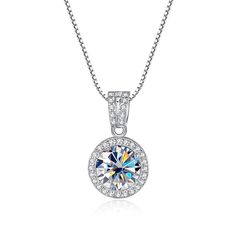 Introducing a necklace that symbolizes commitment and radiance. This Promise Pendant Necklace is meticulously crafted from sterling silver and adorned with a captivating moissanite main stone and sparkling zirconia accents. Description Round Stone Moissanite Main Stone 5A Zirconia Side Stones 1.0ct Sterling Silver Weight About 2.6g GRA Certified قلادات متدلية, Picture Necklace, Rose Violette, Writing Gifts, Tonga, Wedding Item, Samoa, Diamond Pendant Necklace, Pure Gold