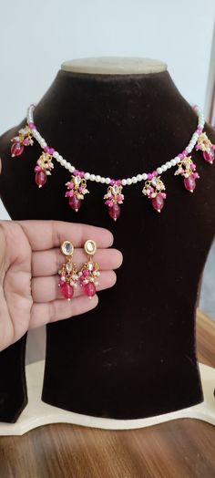 *Beautiful Premium Quality Kundan Choker With Pearls *Combination Of Kundan, Pearls *Quality Of Pearls Is Best *Comes With Matching Earrings *Front Side is Kundan With Pearls *Pearls And Kundan Are Of Original Quality *For More Beautiful Collection, Check At https://www.etsy.com/shop/placeoffashion *Necklace Fitting Is Adjustable *Earring Closure: Push Back **Necklace Closure : Beautiful Silk Thread *It is a Bridal or Partywear Set. *It Will Give You a Unique and Beautiful Look  *You Can Wear Th Pink Kundan Necklace Gift, Pink Necklaces For Party And Festivals, Pink Necklace For Festivals And Gifts, Pink Necklaces For Festivals As Gifts, Pink Necklaces For Festivals Gift, Pink Necklaces For Festivals And Gifts, Pink Beaded Kundan Necklace Gift, Handmade Pink Kundan Necklace For Gift, Pink Choker For Festivals Gift