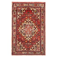 an antique persian rug with red, yellow and blue designs on the center is shown