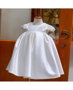 Buy simple satin baby girls flower girl dress baptism with cap sleeves at wholesale price online. Free shipping and pro custom service since 2009. Elegant Fitted Princess Dress, White Cap Sleeve Dress For Wedding, Fitted Satin Dress With Cap Sleeves, Spring First Communion Dress With Short Sleeves, Fitted Princess Style First Communion Dress With Short Sleeves, Fitted Short Sleeve Princess Dress For Wedding, Elegant Short Sleeve Princess Dress For Confirmation, Fitted Short Sleeve Princess Wedding Dress, Elegant Wedding Princess Dress