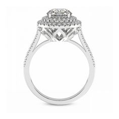 This classic and stunning women's ring features a 1/2Ct center and round brilliant cut accent side stones. All diamonds are prong set in solid 10k white or yellow gold polished ring setting. The shank of the ring has accent diamonds on to give it a designer look. Timeless Halo Ring With Prong Setting, Moissanite Diamond Ring With Prong Setting, Classic Round Halo Ring With Lab Grown Diamond, Timeless Round Cluster Ring With Prong Setting, Classic Halo Ring With Lab Grown Diamond, Round Cut Lab Grown Diamond Ring With Vvs Clarity, Round Cut Rings With Vvs Clarity Lab-grown Diamonds, Vvs Clarity Lab Grown Diamond Ring With Round Cut, Moissanite Diamond Ring With Prong Setting In Round Cut