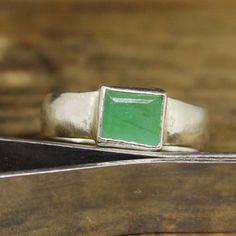 Raw Natural Emerald Unique Design Minimalist Sterling Silver Ring - Men's Women's Handmade Ring  Fine Jewelry  - Description - Handmade to Order - Sterling Silver 925 K - Green Emerald - Gold Plated Ring - Available Finish Color: Rose Gold, Yellow Gold, Silver - Gemstone : Emerald - Listing Just for one piece ring - Ready to Ship in 2-5 Business Days - May Birthstone My work is my reputation, you will be happy with the quality ,all my work is 100% genuine and comes with a special guarantee for all my customers abroad,I look forward to do some business. Shipping Policy: We Ship the item to worldwide From Amerika, so please pay attention to the shipping time before please the order. To US : the item will be shipped by USPS and takes 2-5 days to arrive. To other countries : the item will be s Green Minimalist Signet Ring For Anniversary, Minimalist Green Signet Ring, Minimalist Silver Emerald Ring With Bezel Setting, Silver Minimalist Emerald Ring With Bezel Setting, Handmade Minimalist Emerald Ring, Emerald Jewelry Ring, Emerald Birthstone Ring, Rose Gold Emerald Ring, Antique Emerald Ring