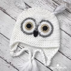 a crocheted owl hat with big eyes