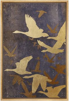 an image of birds flying in the sky with gold foil on it's wings